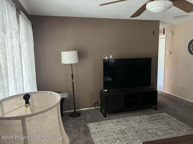 12801 Winding Way, Hudson, FL 34667 - carpeted living room featuring ceiling fan and baseboards