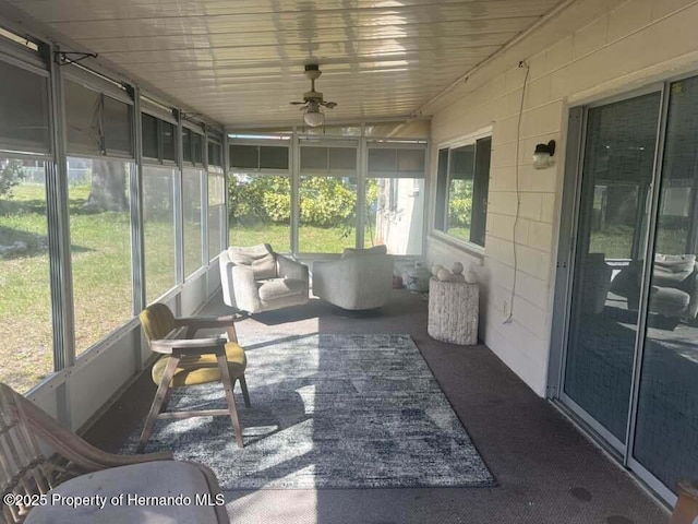12801 Winding Way, Hudson, FL 34667 - sunroom with ceiling fan