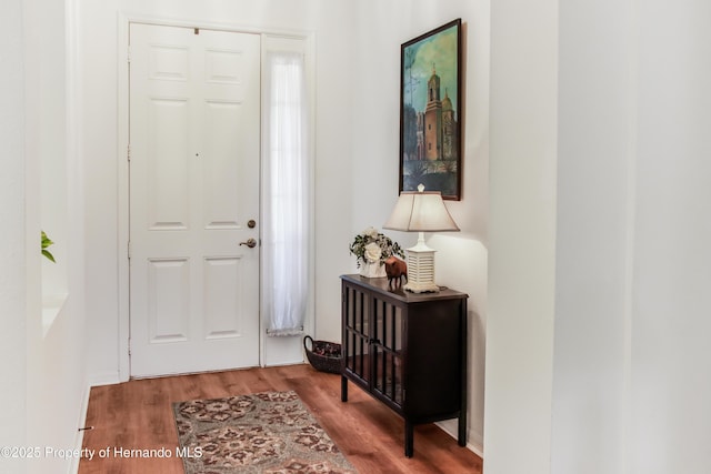 5233 Jennings Trl, Brooksville, FL 34601 - entrance foyer featuring wood finished floors