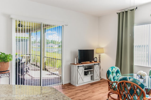 5233 Jennings Trl, Brooksville, FL 34601 - living area featuring wood finished floors and baseboards
