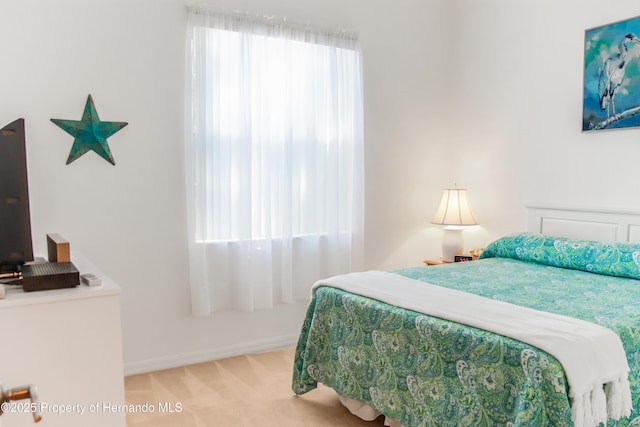 5233 Jennings Trl, Brooksville, FL 34601 - carpeted bedroom with baseboards
