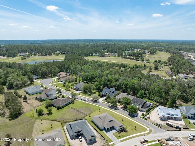 4056 Southern Valley Loop, Brooksville, FL 34601 - aerial view of residential area with a large body of water and a forest