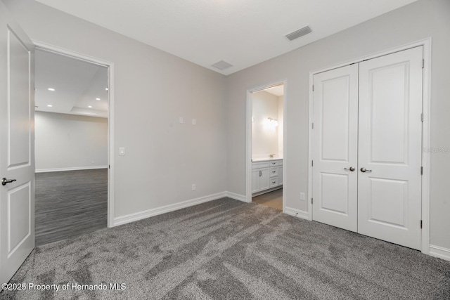 4056 Southern Valley Loop, Brooksville, FL 34601 - unfurnished bedroom featuring baseboards, carpet floors, ensuite bathroom, and recessed lighting