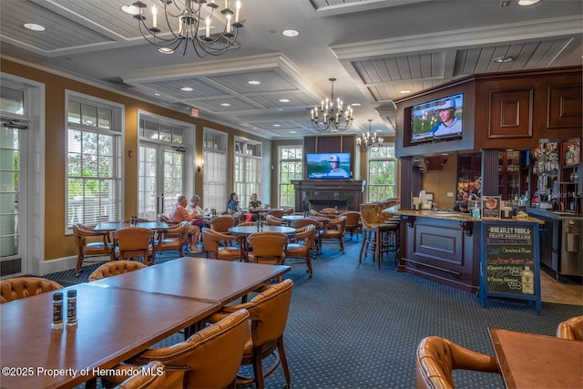 4056 Southern Valley Loop, Brooksville, FL 34601 - dining area with a chandelier, crown molding, dark carpet, recessed lighting, and coffered ceiling