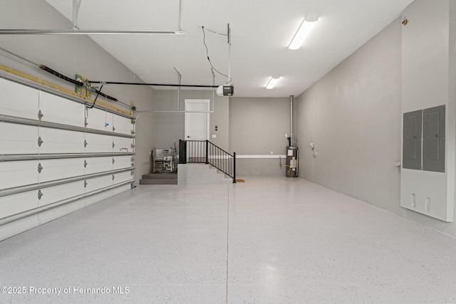 4522 Majestic Hills Loop, Brooksville, FL 34601 - garage featuring a garage door opener, electric panel, and water heater