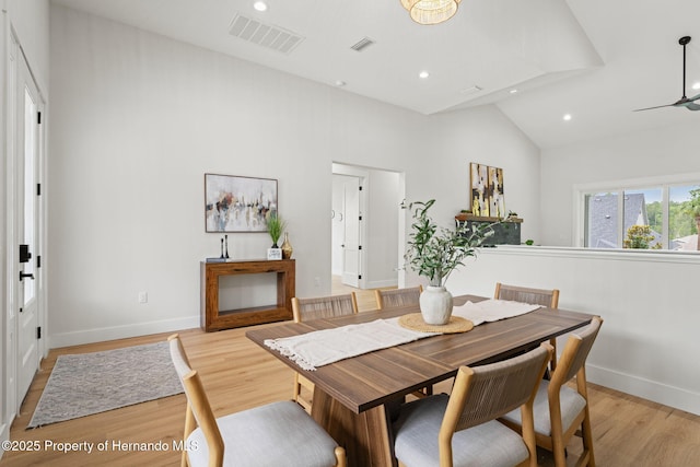 4522 Majestic Hills Loop, Brooksville, FL 34601 - dining room featuring light wood finished floors, recessed lighting, and high vaulted ceiling