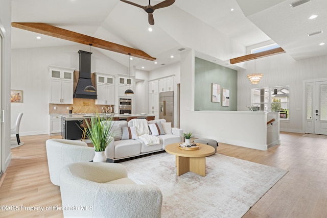 4522 Majestic Hills Loop, Brooksville, FL 34601 - living room with high vaulted ceiling, ceiling fan, light wood finished floors, recessed lighting, and beamed ceiling