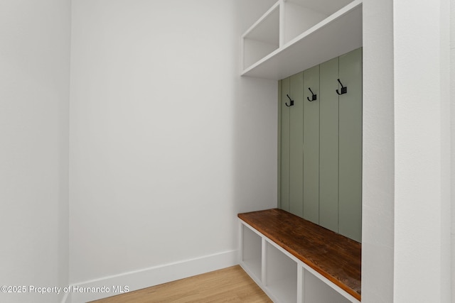 4522 Majestic Hills Loop, Brooksville, FL 34601 - mudroom with light wood finished floors and baseboards