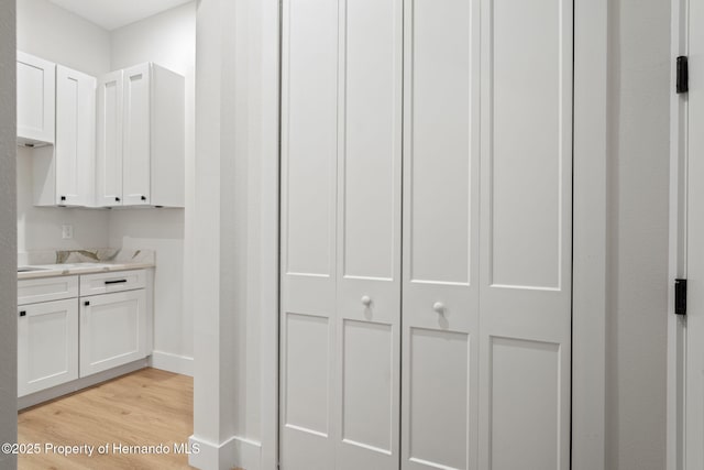 4522 Majestic Hills Loop, Brooksville, FL 34601 - washroom featuring light wood finished floors and baseboards