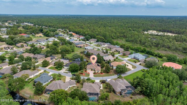 8308 Mobile Cir, Weeki Wachee, FL 34613 - view of property location with a heavily wooded area and nearby suburban area