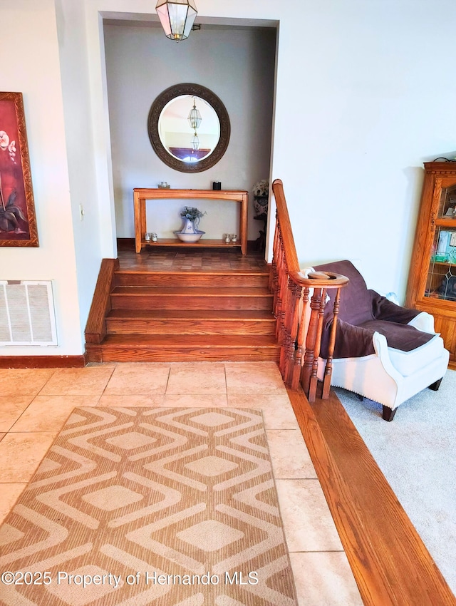 6208 Roble Ave, Spring Hill, FL 34608 - stairway with tile patterned floors