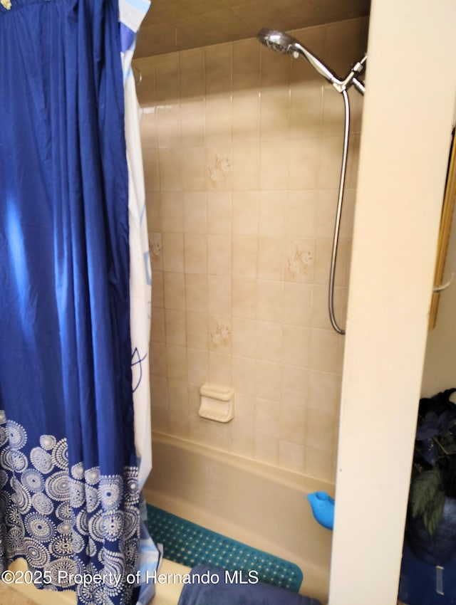 6208 Roble Ave, Spring Hill, FL 34608 - bathroom featuring shower / tub combo