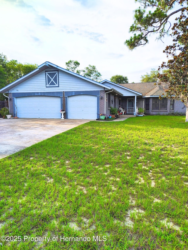 6208 Roble Ave, Spring Hill, FL 34608 - ranch-style house with a front yard, concrete driveway, brick siding, and an attached garage