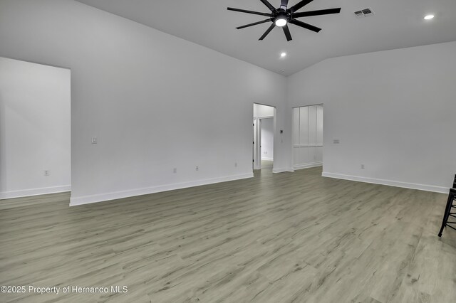 1080 Dunlap Ave, Spring Hill, FL 34609 - spare room featuring ceiling fan, baseboards, high vaulted ceiling, wood finished floors, and recessed lighting