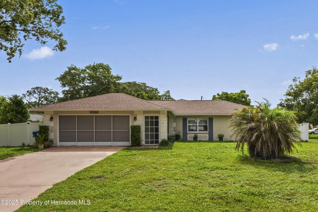 1038 Shenandoah Ln, Spring Hill, FL 34606 - single story home with an attached garage, concrete driveway, and stucco siding