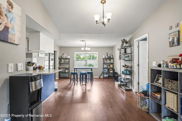 1038 Shenandoah Ln, Spring Hill, FL 34606 - dining space featuring a chandelier and dark wood finished floors