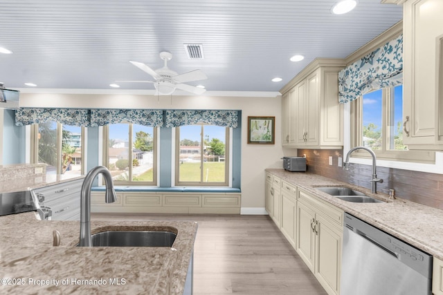 4523 Gulfstream Dr, Hernando Beach, FL 34607 - kitchen featuring dishwasher, a sink, plenty of natural light, recessed lighting, and ornamental molding