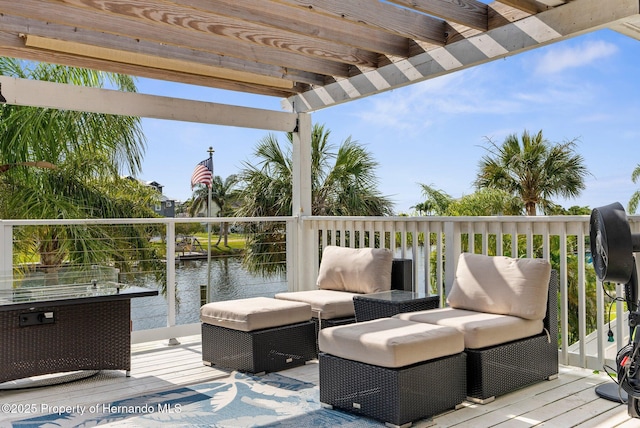 4523 Gulfstream Dr, Hernando Beach, FL 34607 - wooden terrace with a water view and an outdoor hangout area