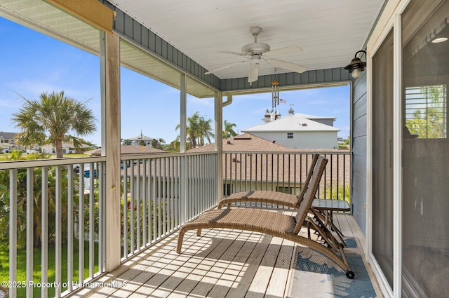 4523 Gulfstream Dr, Hernando Beach, FL 34607 - deck featuring a ceiling fan and a residential view