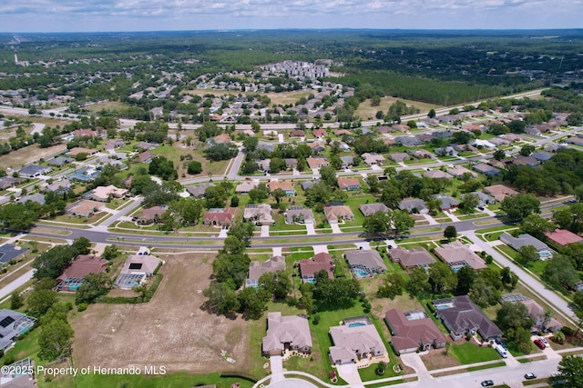 13417 Whitehaven Ct, Spring Hill, FL 34609 - aerial view of property and surrounding area with nearby suburban area