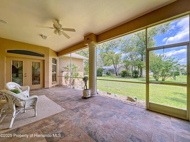 13417 Whitehaven Ct, Spring Hill, FL 34609 - unfurnished sunroom with a ceiling fan and french doors