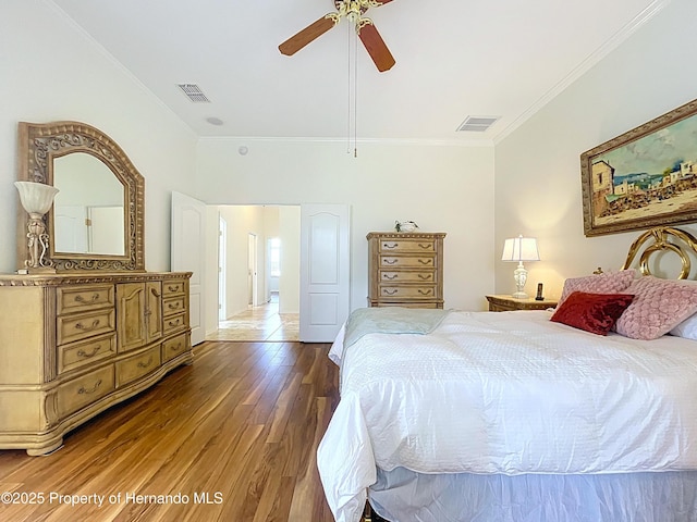 13417 Whitehaven Ct, Spring Hill, FL 34609 - bedroom featuring crown molding, wood finished floors, and a ceiling fan