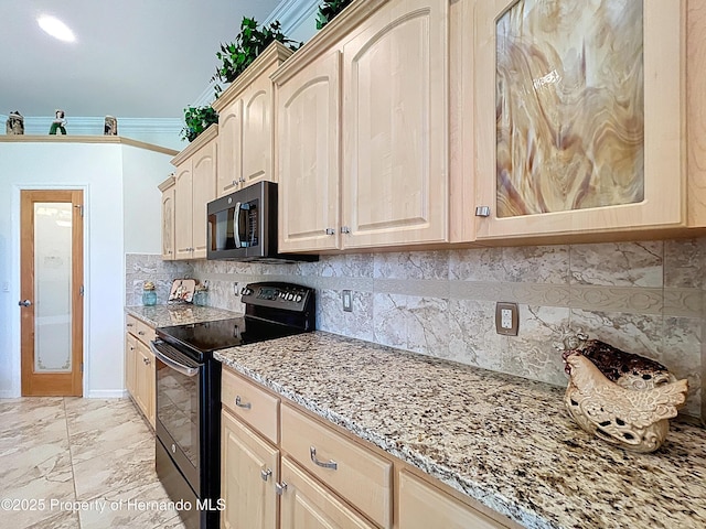 13417 Whitehaven Ct, Spring Hill, FL 34609 - kitchen with black appliances, light stone counters, tasteful backsplash, and light brown cabinetry