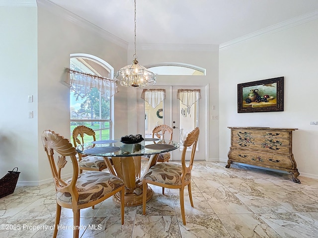 13417 Whitehaven Ct, Spring Hill, FL 34609 - dining space with french doors, crown molding, a chandelier, light marble finish floors, and baseboards