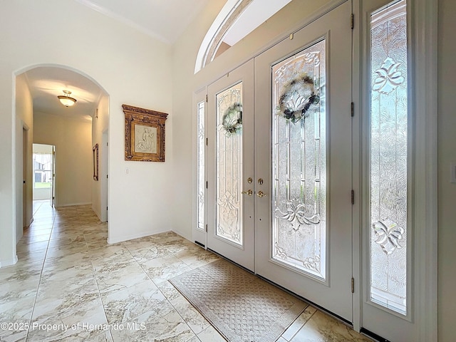 13417 Whitehaven Ct, Spring Hill, FL 34609 - foyer with arched walkways and baseboards