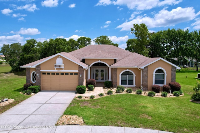 13417 Whitehaven Ct, Spring Hill, FL 34609 - mediterranean / spanish house with french doors, a garage, a front yard, and driveway