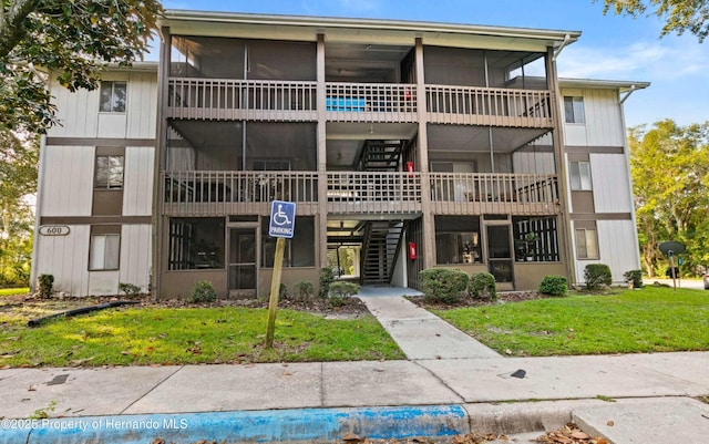 6519 W Newberry Rd Unit 107, Gainesville, FL 32605 - view of property featuring stairs