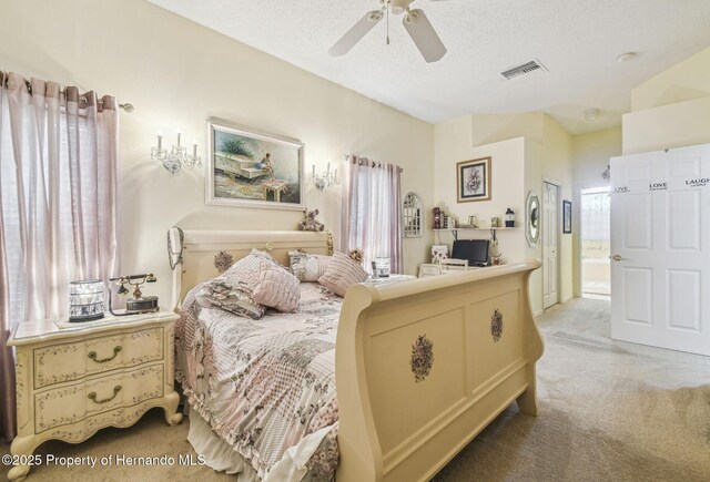 18223 Nestlebranch Ct, Hudson, FL 34667 - bedroom featuring light carpet, ceiling fan, a textured ceiling, and ensuite bathroom