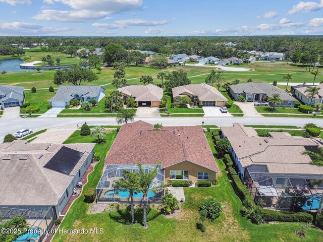 18223 Nestlebranch Ct, Hudson, FL 34667 - aerial perspective of suburban area with a golf course and a nearby body of water