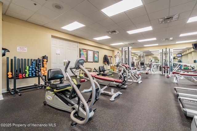 18223 Nestlebranch Ct, Hudson, FL 34667 - workout area with a paneled ceiling