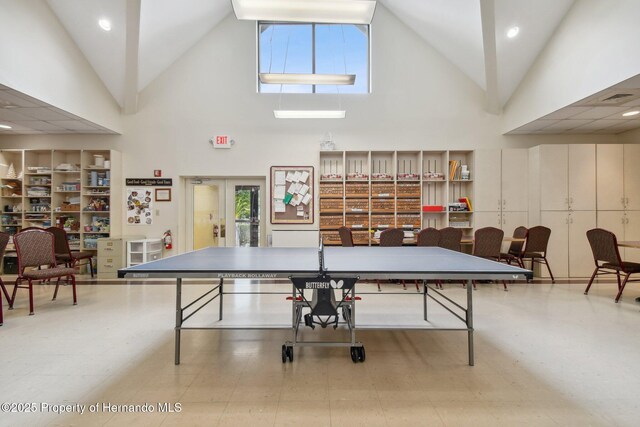 18223 Nestlebranch Ct, Hudson, FL 34667 - recreation room with high vaulted ceiling and french doors