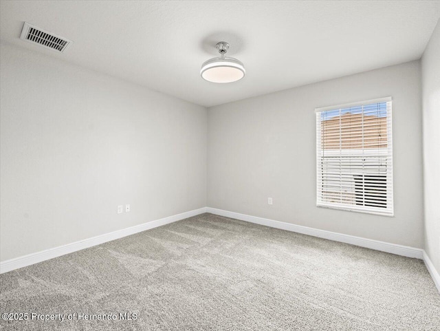 12167 Bath St, Spring Hill, FL 34609 - unfurnished room with carpet floors and baseboards