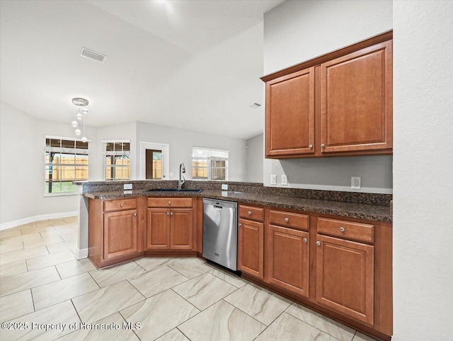 12167 Bath St, Spring Hill, FL 34609 - kitchen with dishwasher, a sink, a peninsula, and plenty of natural light