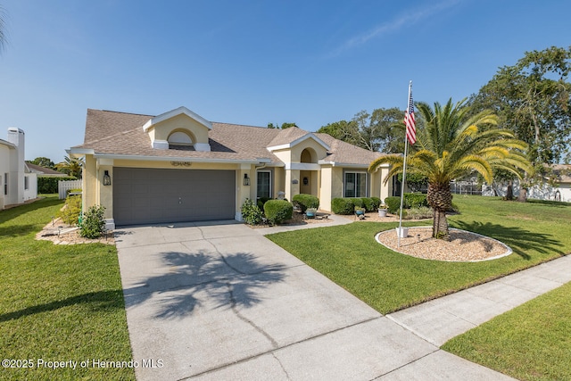 1049 Larkin Rd, Spring Hill, FL 34608 - single story home with stucco siding, an attached garage, driveway, a front yard, and a shingled roof