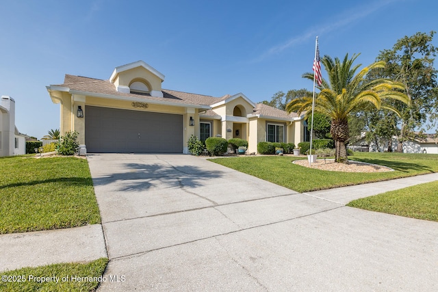 1049 Larkin Rd, Spring Hill, FL 34608 - ranch-style home with concrete driveway, stucco siding, a front lawn, and an attached garage