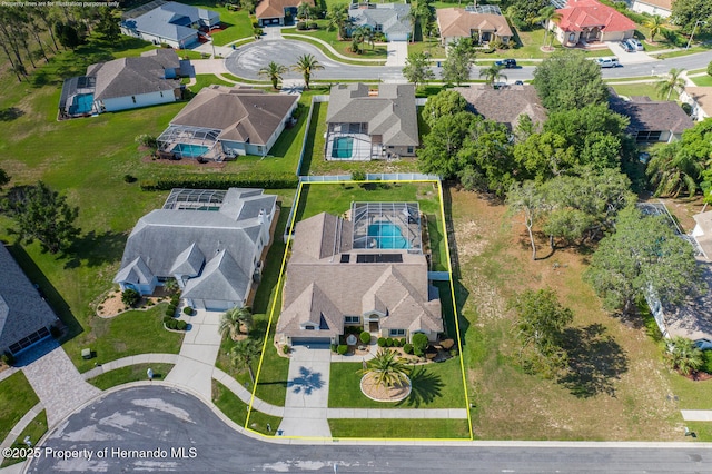 1049 Larkin Rd, Spring Hill, FL 34608 - aerial view of residential area featuring a pool and property boundaries highlighted