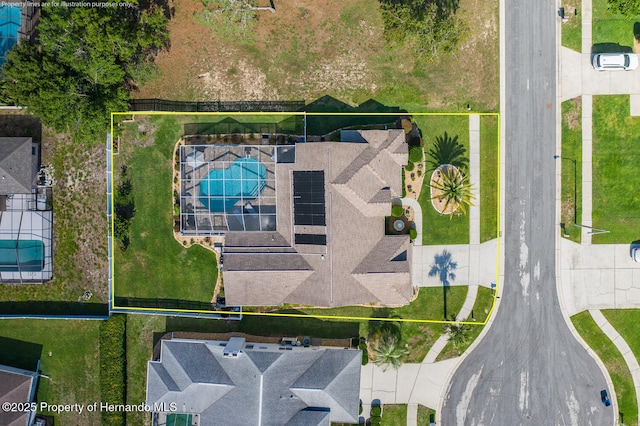 1049 Larkin Rd, Spring Hill, FL 34608 - aerial view of property and surrounding area with property boundaries highlighted
