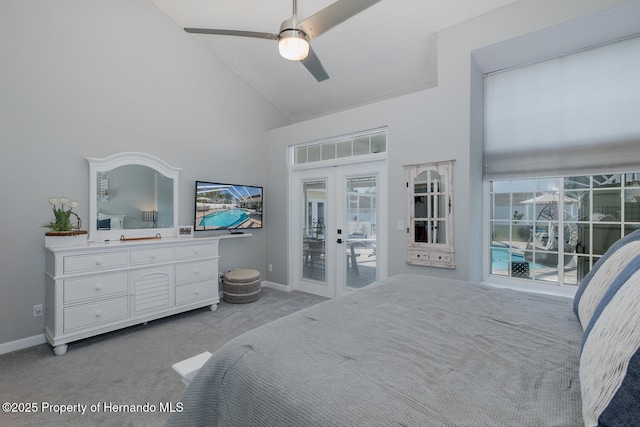 1049 Larkin Rd, Spring Hill, FL 34608 - bedroom featuring high vaulted ceiling, french doors, multiple windows, access to exterior, and baseboards