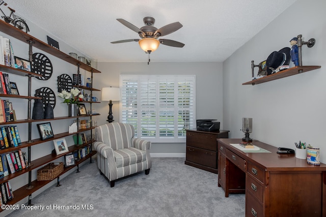 1049 Larkin Rd, Spring Hill, FL 34608 - sitting room featuring ceiling fan, light carpet, an office area, baseboards, and a textured ceiling