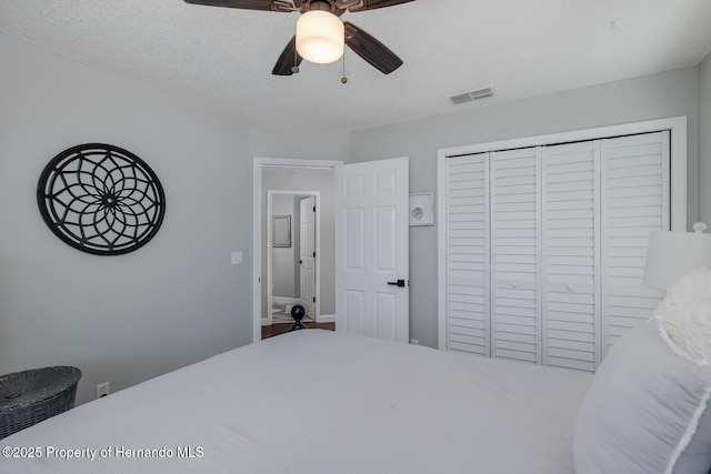 1049 Larkin Rd, Spring Hill, FL 34608 - bedroom featuring a closet and ceiling fan