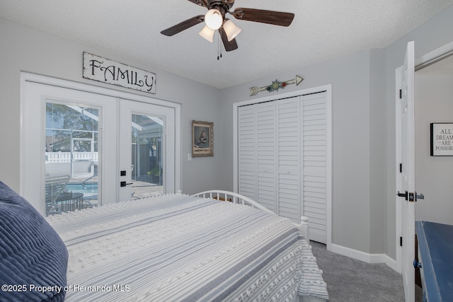 1049 Larkin Rd, Spring Hill, FL 34608 - carpeted bedroom with access to exterior, french doors, baseboards, a closet, and a ceiling fan