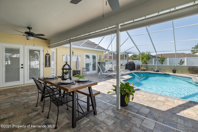 1049 Larkin Rd, Spring Hill, FL 34608 - view of pool featuring french doors, ceiling fan, a patio, and glass enclosure