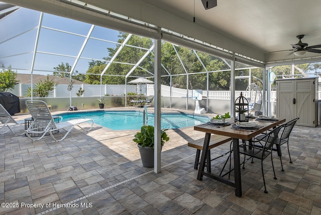 1049 Larkin Rd, Spring Hill, FL 34608 - view of pool with ceiling fan, a fenced backyard, a patio area, and glass enclosure