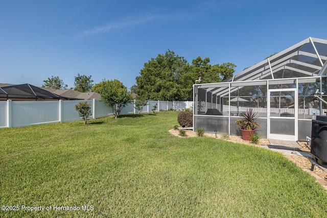1049 Larkin Rd, Spring Hill, FL 34608 - view of yard featuring glass enclosure