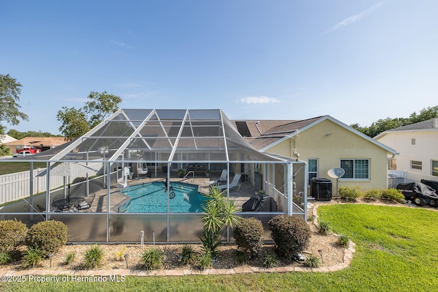1049 Larkin Rd, Spring Hill, FL 34608 - view of swimming pool featuring a lanai, a patio area, and cooling unit
