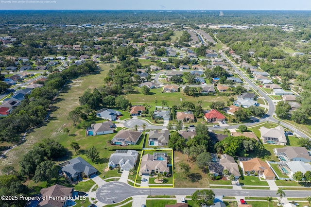 1049 Larkin Rd, Spring Hill, FL 34608 - aerial overview of property's location with nearby suburban area